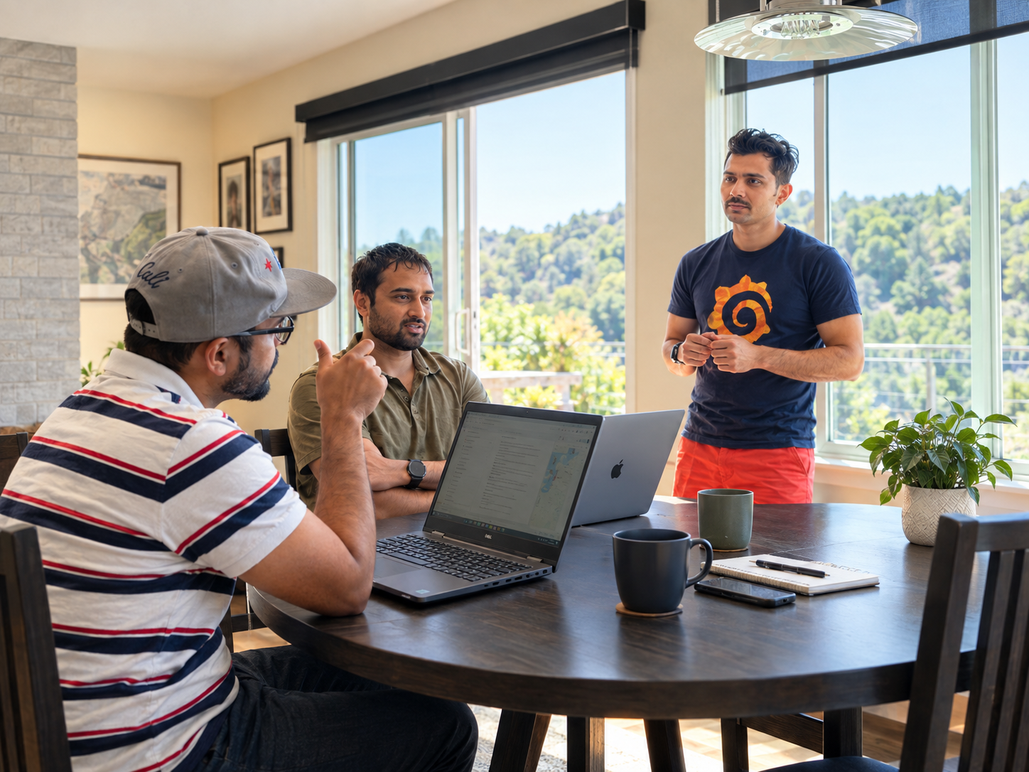 Team members talking through a problem around a table