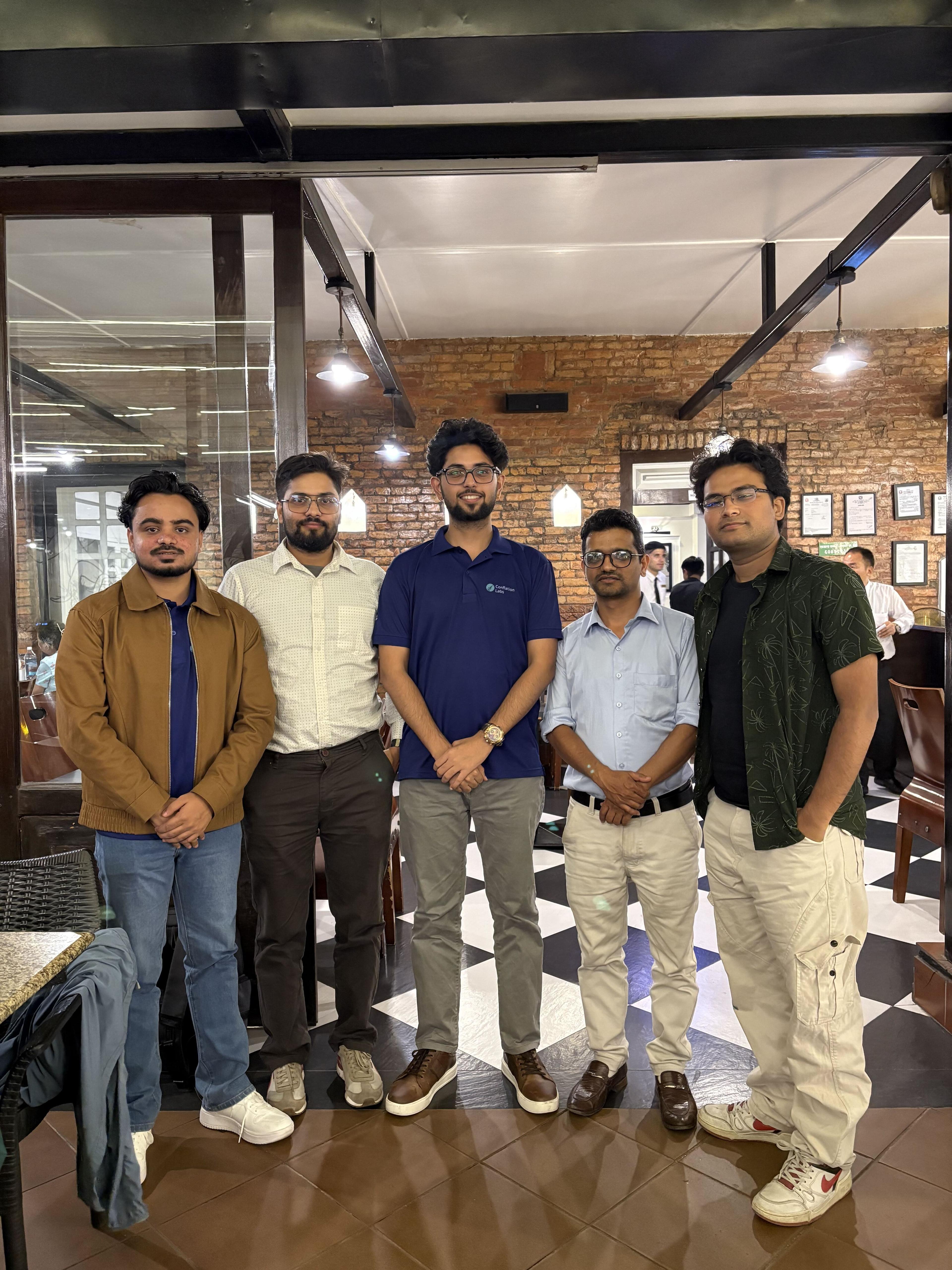 Five members of the Conflation Labs team standing together